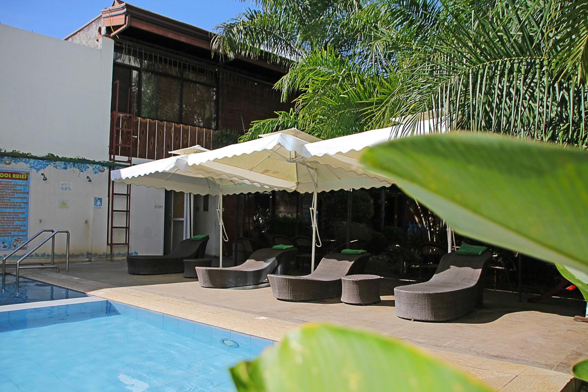 Palawan Uno Hotel Puerto Princesa Exterior photo