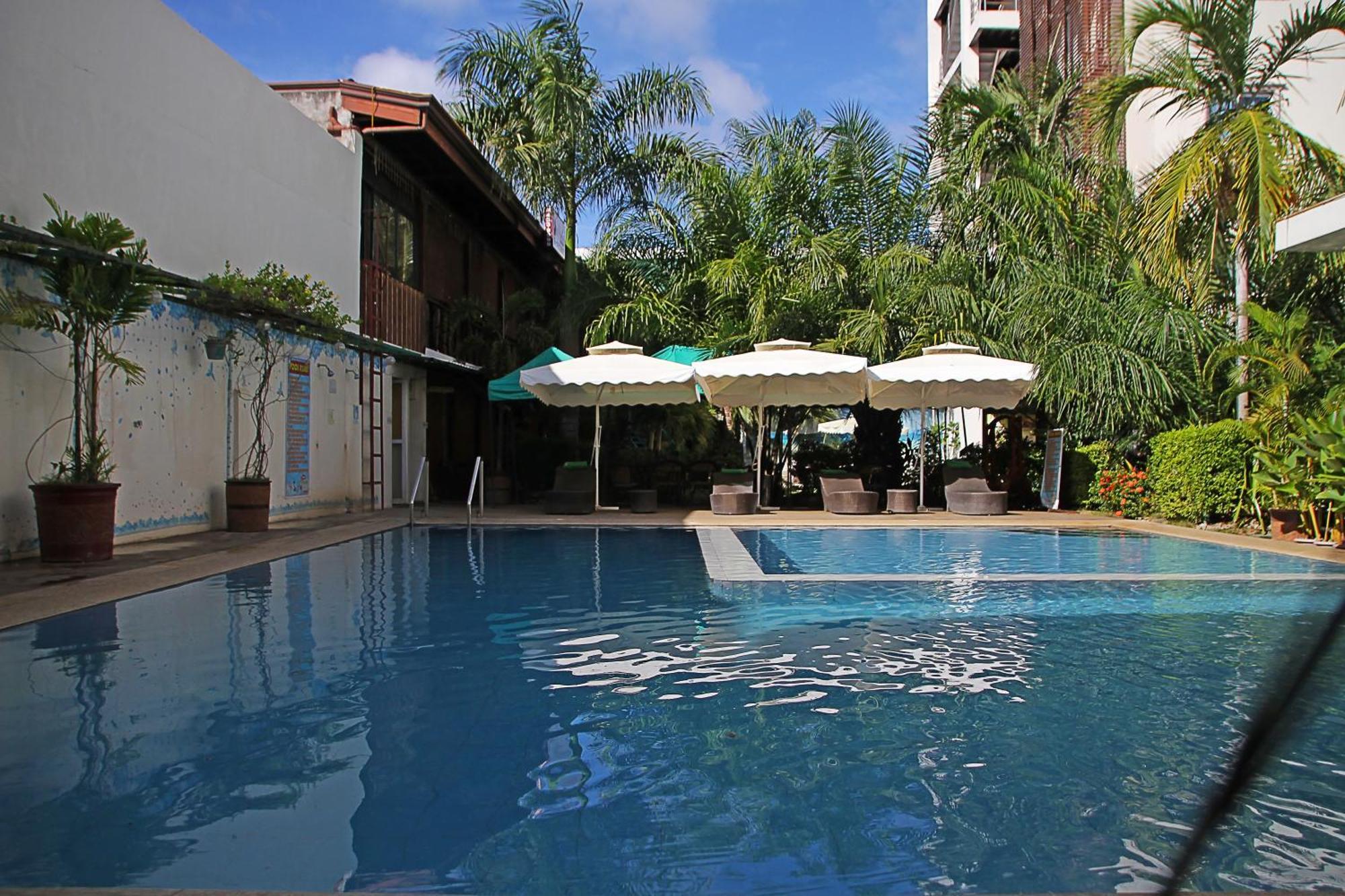 Palawan Uno Hotel Puerto Princesa Exterior photo