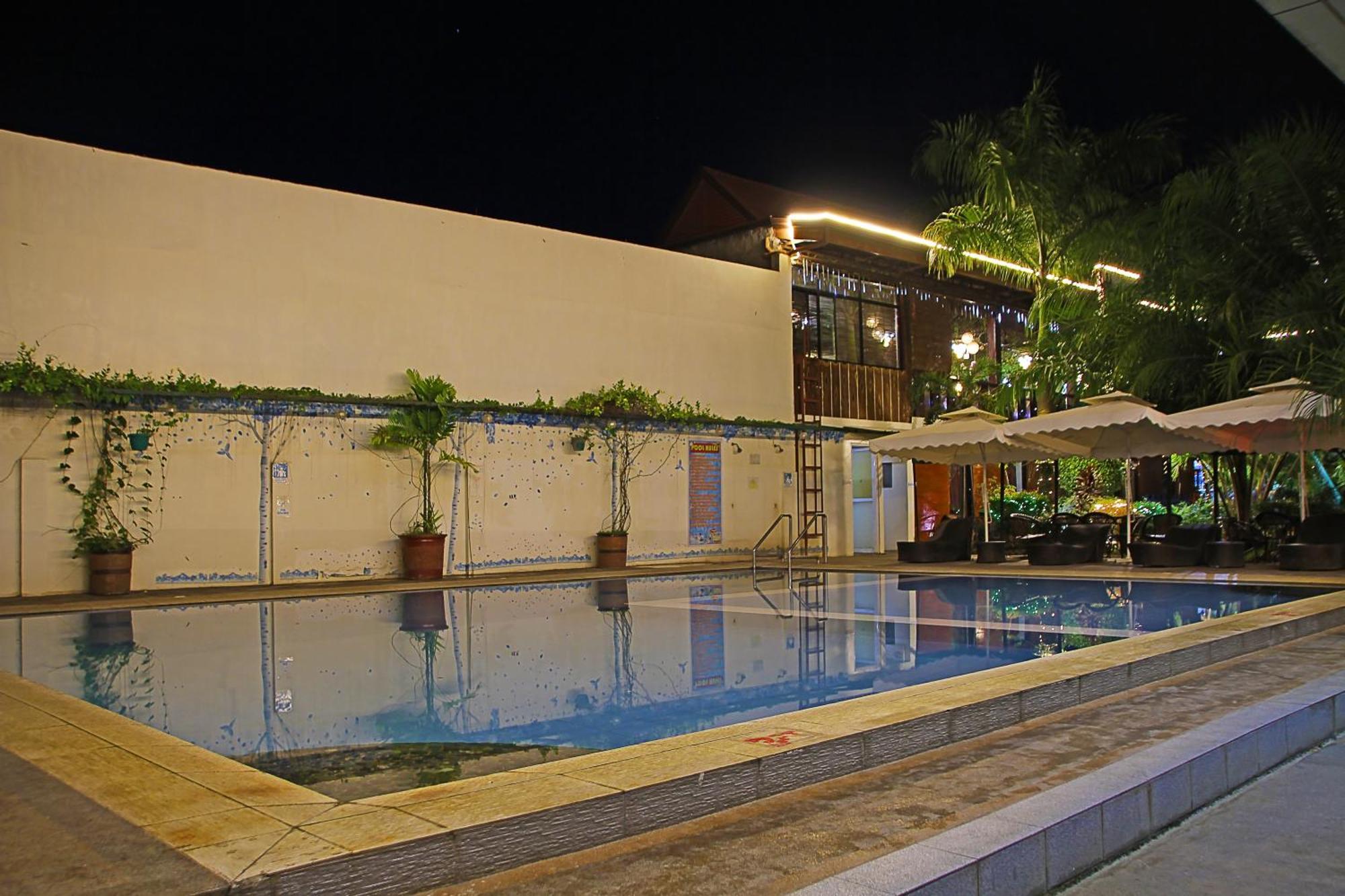 Palawan Uno Hotel Puerto Princesa Exterior photo
