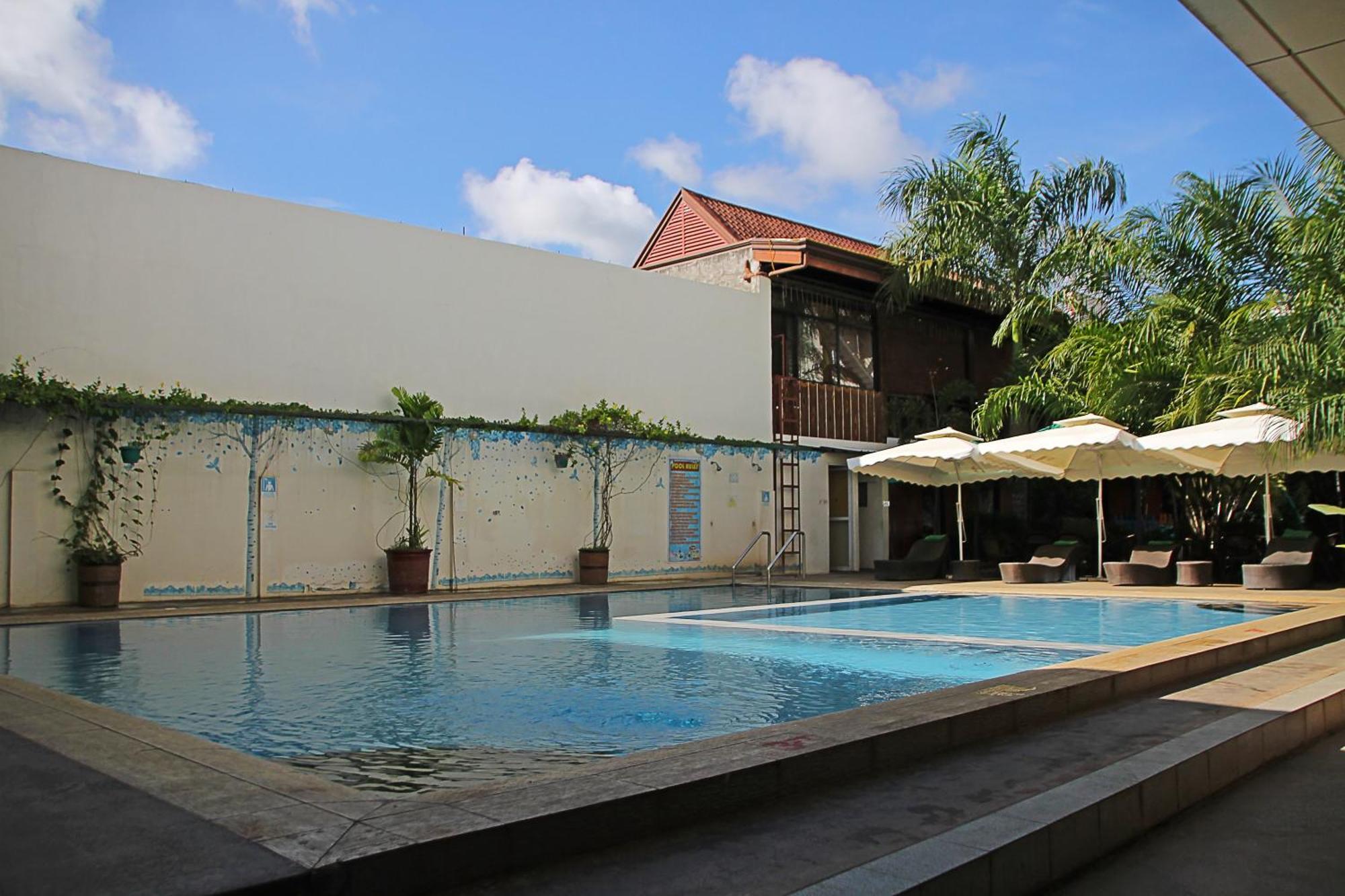 Palawan Uno Hotel Puerto Princesa Exterior photo