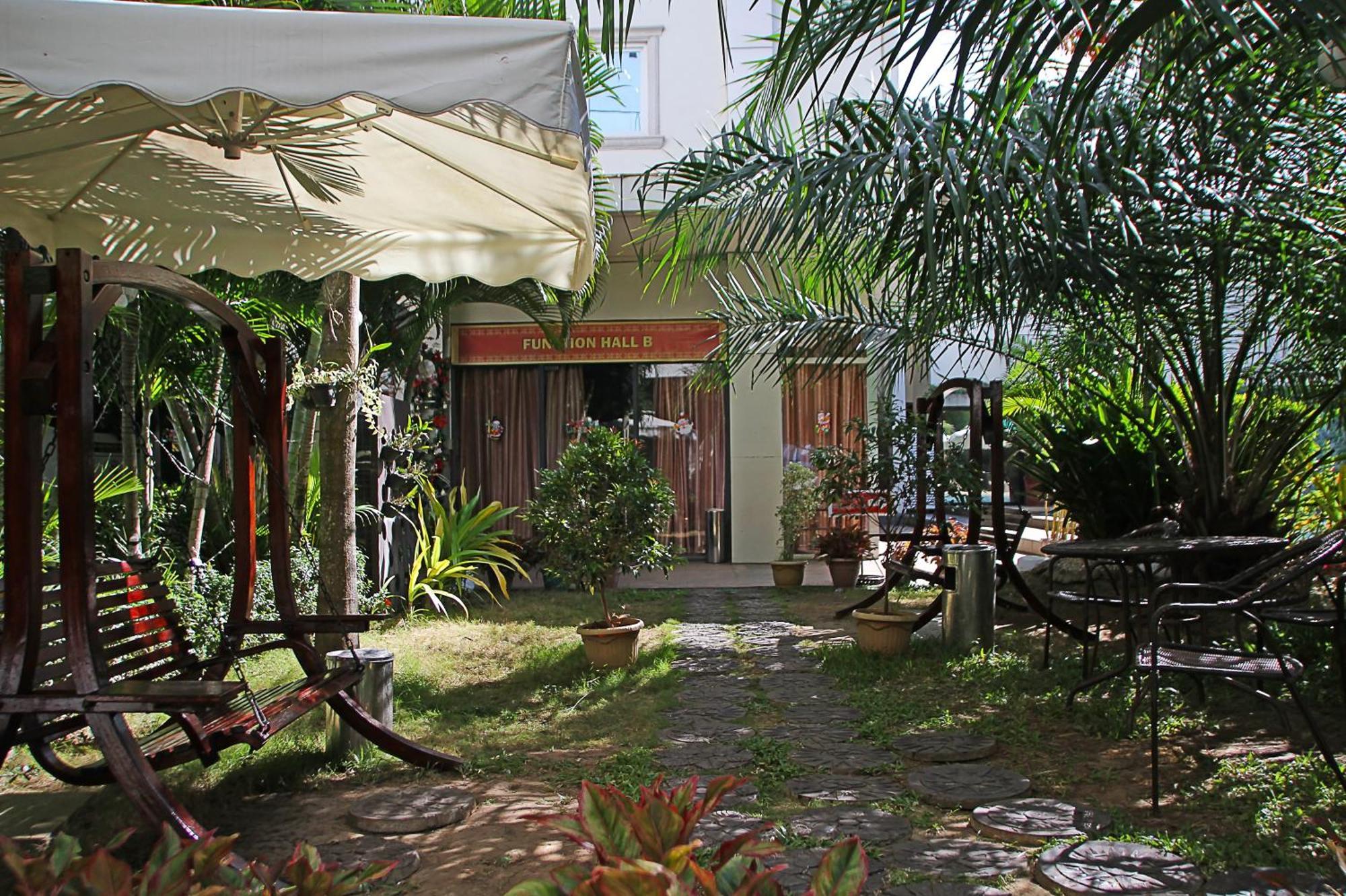Palawan Uno Hotel Puerto Princesa Exterior photo