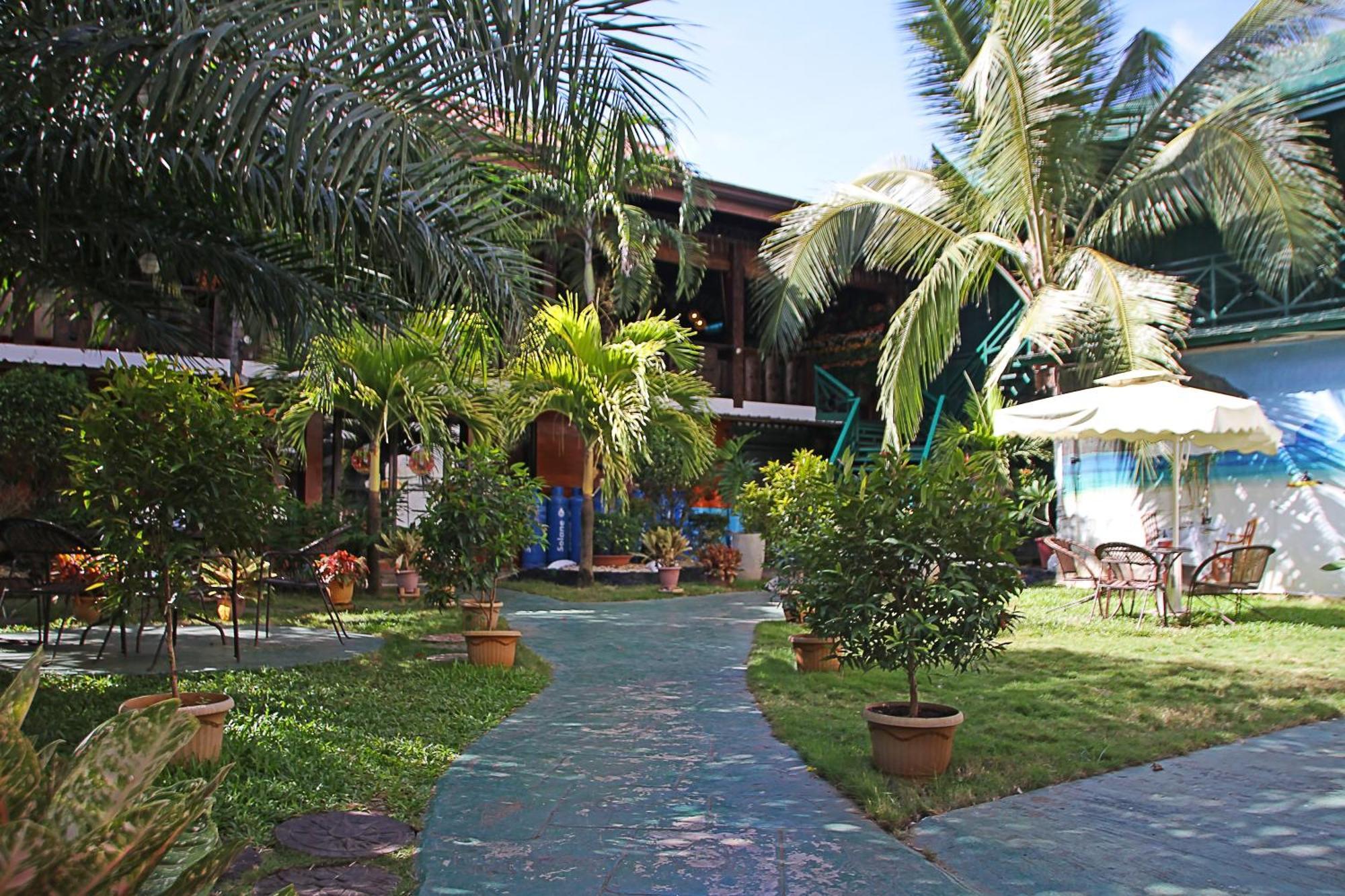 Palawan Uno Hotel Puerto Princesa Exterior photo